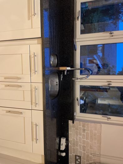 Entire kitchen Quartz work top solid wooden shaker style doors