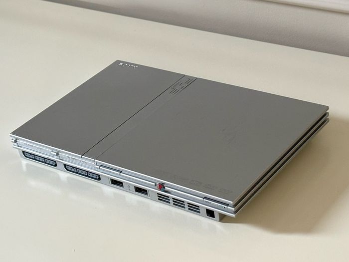 Original Sony PlayStation 2 Slimline Console in Satin Silver Boxed and Beautiful