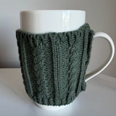 Cosy coffee mug with woolly jumper