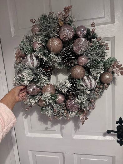 Stunning pink snow flocked wreath