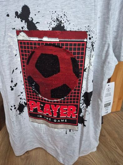 Brand new T-shirt, size 13-14y