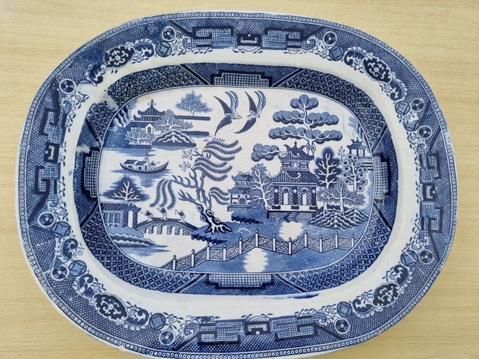 Two large Blue & White Willow Pattern Plates