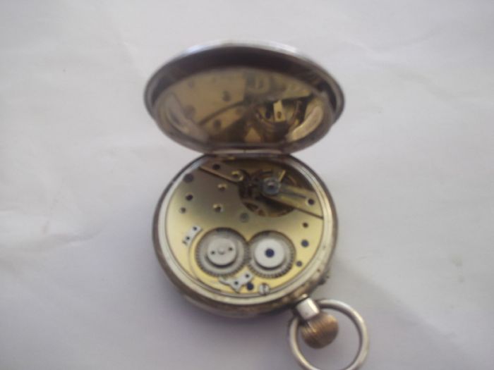 a antique open face solid silver pocket watch