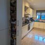 Kitchen with black granite worktop Image 5