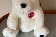 Vintage 1990s Coca-Cola polar bear plush toy featuring the classic red circular Coca-Cola logo