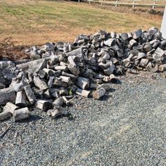 Large pile of seasoned firewood
