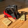Bruder Linde H30D Forklift with Trailer Coupling and 2 Pallets scale 1:16 Image 6