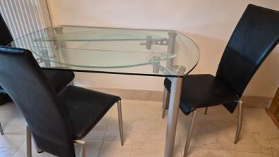 Extendable glass dining table and 3 chairs