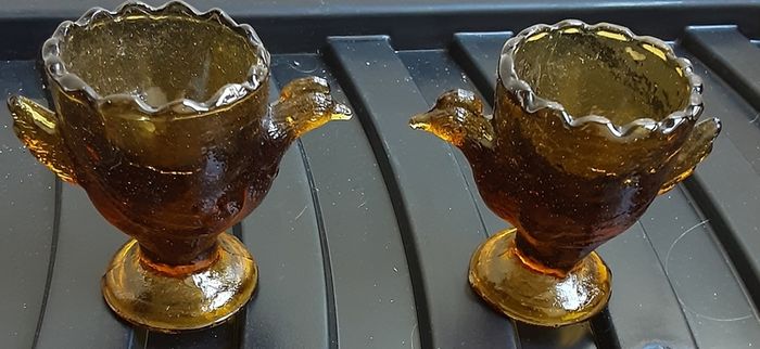 Cockerell and hen plus, around ten or 12 inches tall