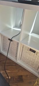 Ikea Kallax Unit with 2 white whikker baskets to go with it.