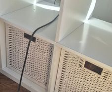 Ikea Kallax Unit with 2 white whikker baskets to go with it.