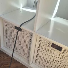 Ikea Kallax Unit with 2 white whikker baskets to go with it.