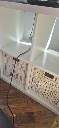 Ikea Kallax Unit with 2 white whikker baskets to go with it.