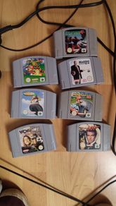 Nintendo 64 with one controller and 6 games.