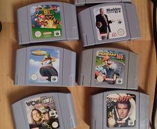 Nintendo 64 with one controller and 6 games.