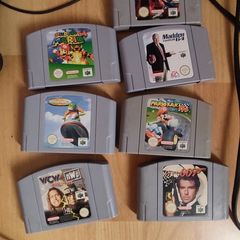 Nintendo 64 with one controller and 6 games.
