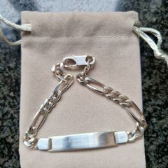 Sterling silver figaro bracelet.
