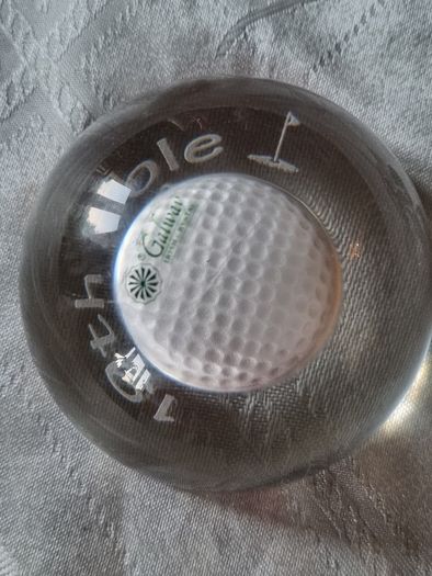 Galway Crystal paperweight with a golf ball