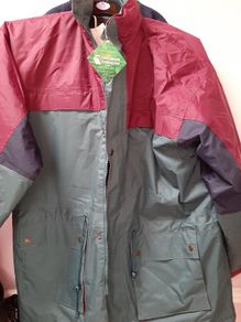 new XL waterproof padded jacket tag attached