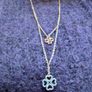 silver pendant with two shamrocks and two lil stones Image 4