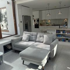 L-Shaped Sofa with grey matching cushions