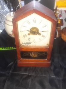 A Beautiful Antique Jerome Mantel or Cottage Clock in Architectural Hardwood Case