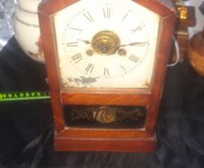 A Beautiful Antique Jerome Mantel or Cottage Clock in Architectural Hardwood Case