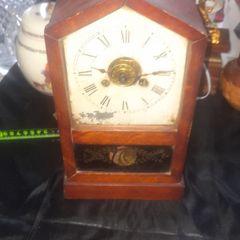 A Beautiful Antique Jerome Mantel or Cottage Clock in Architectural Hardwood Case