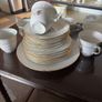 Six piece set of finebone  China, six cups, six saucers, six side plates, one larger plate and sugar bowl. Image 2