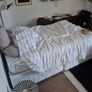 Double bed with mattress and table. Image 3
