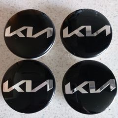 4 x KIA centre caps (New logo)  FREE POST
