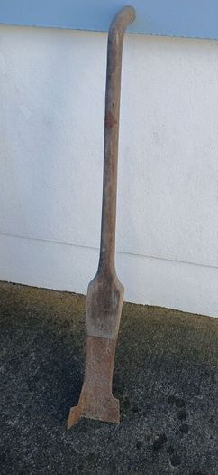 Antique peat wheelbarrow and peat spade