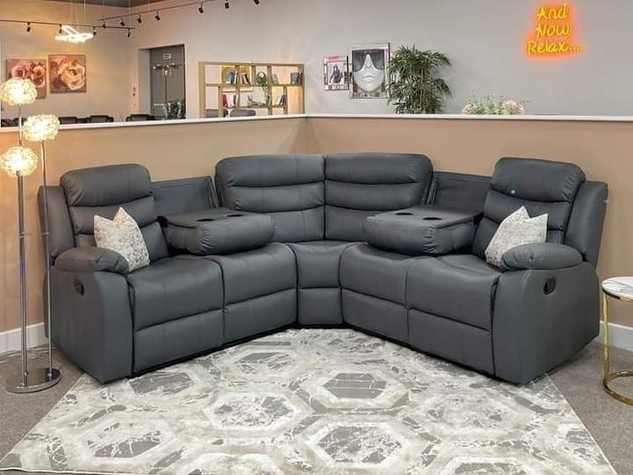 MESSIVE SALE ON RECLINER COUCHES.Drop down cupholders with  wireless chargers and USB ports. Corner Couches and 3+2 sets instock