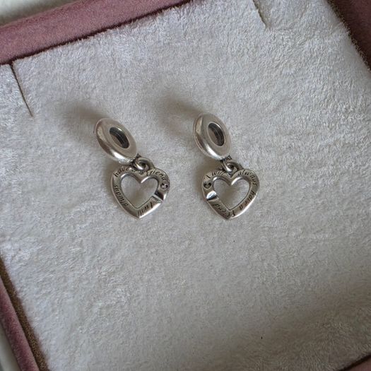 Pandora linked sister hearts split dangle charm. Very good condition hallmarked
