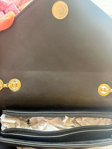 ladies black padded bag with gold coloured hardware. Brand new
