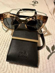 Sun glasses designer Mo mo
