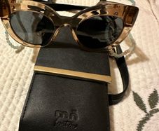 Sun glasses designer Mo mo