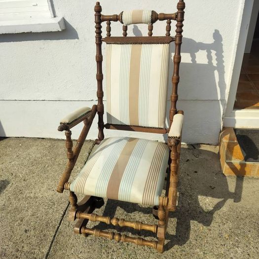 Swinging antique armchair