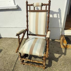 Swinging antique armchair