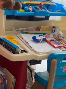 Toddler. playing desk with 2 pockets side storage very well kept