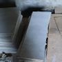 Wall and floor tiles and bathroom. Talll boy