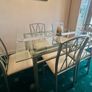 Glass dining table and 6 chairs Image 2