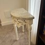 ornate half-moon console table with a granite top Image 7