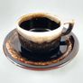 Vintage American studio pottery cups and saucers. Image 2