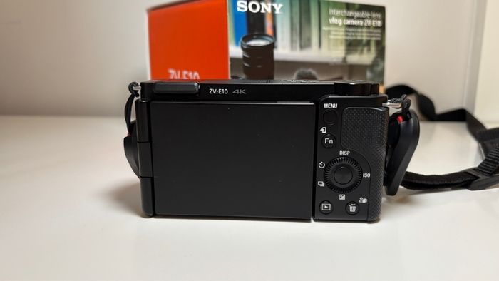 Sony ZVE-10 + Sony E 18-105mm f/4 lens (cage and 5 batteries)