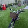 Purple bike with basket Image 2