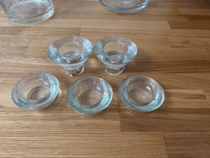 Glass tea light holders