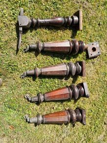 Antique mahogany piano legs with bronze casters