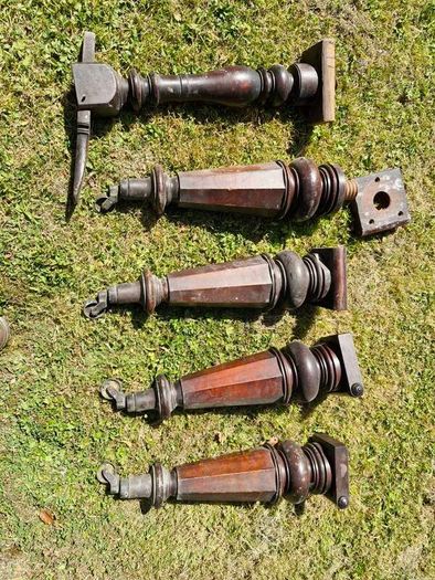 Antique mahogany piano legs with bronze casters