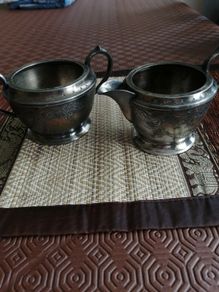 silver/pewter jug and sugarbowl